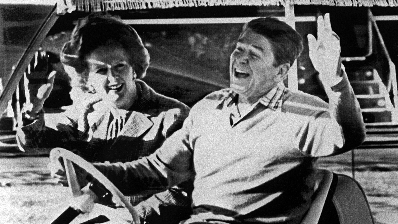 Ronald Reagan and Margaret Thatcher in golf cart